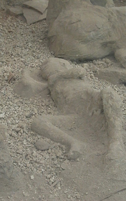 The ghostly cast of a child, in the olive grove of Pompeii.